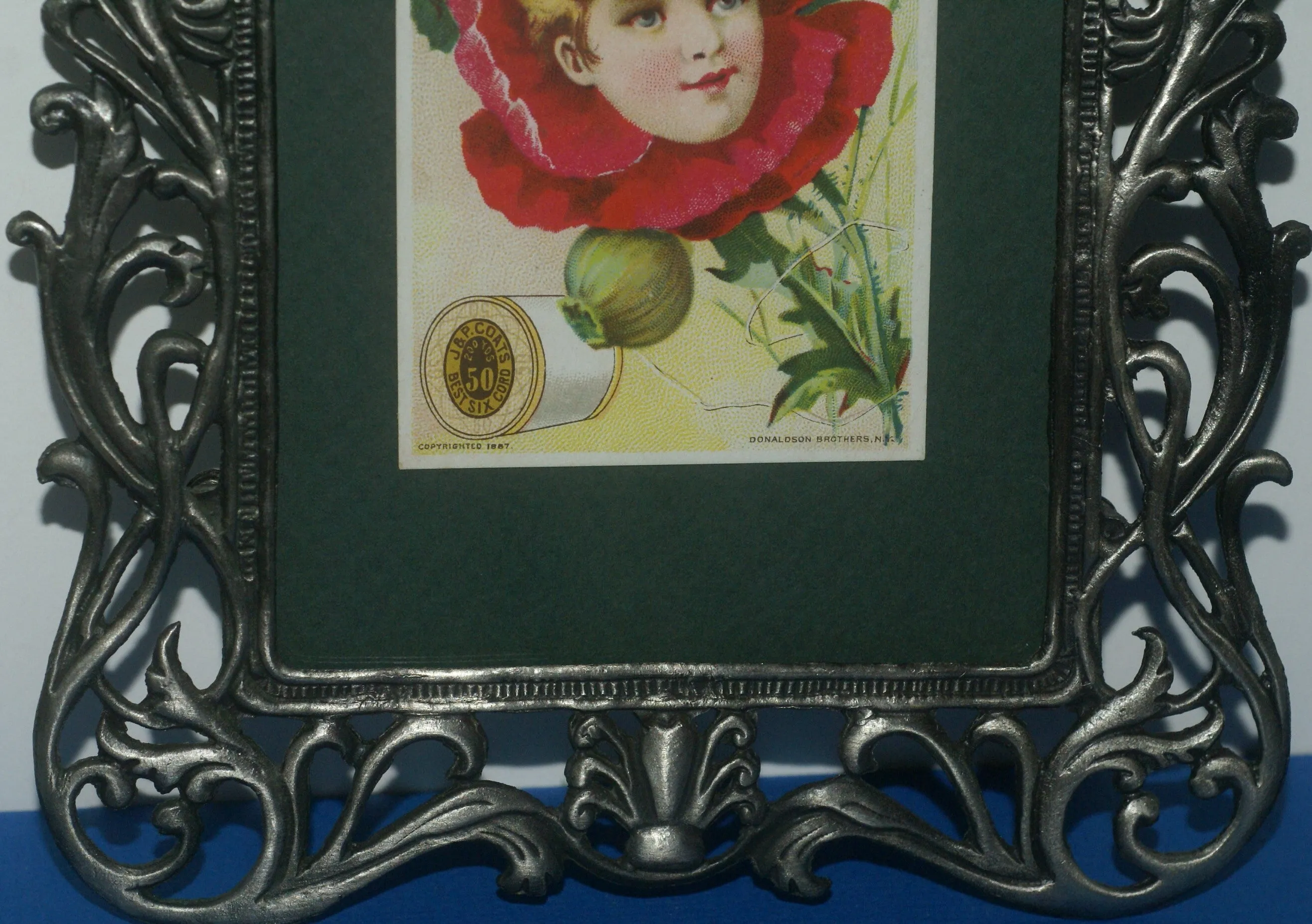 EPHEMERA AMERICANA ANTIQUE WHIMSICAL ART 1887 IN ORNATE FRAME & MATTED, ANTIQUE VICTORIAN ADVERTISING TRADE CARD OF POPPY GIRL: J.& P. Coats (DFPO2J) LACY METAL FRAME 8,5" X 6",5 DESIGNER COLLECTOR COLLECTIBLE WALL DÉCOR